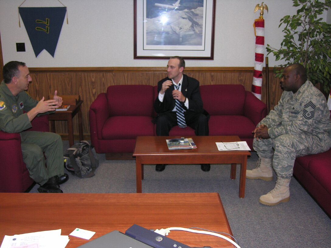 SEYMOUR JOHNSON AIR FORCE BASE, N.C. -- Lt. Col. Bill Uptmor (left) and Chief Master Sgt. Garry Seay (right) talk with Goldsboro News Argus Reporter Ken Fine about the 911th Air Refueling Squadron activation this weekend. Colonel Uptmor is the new active duty squadron commander and Chief Seay is the squadron's superintendant. The 911th ARS will integrate with the Air Force Reserve's 916th Air Refueling Wing becoming the first Active-associate unit in Air Force history. The activation ceremony will take place at 9:11am on Saturday morning and the squadron hopes to be fully manned with 260 active duty troops by the end of summer. U.S. Air Force photo/Capt. Shannon Mann