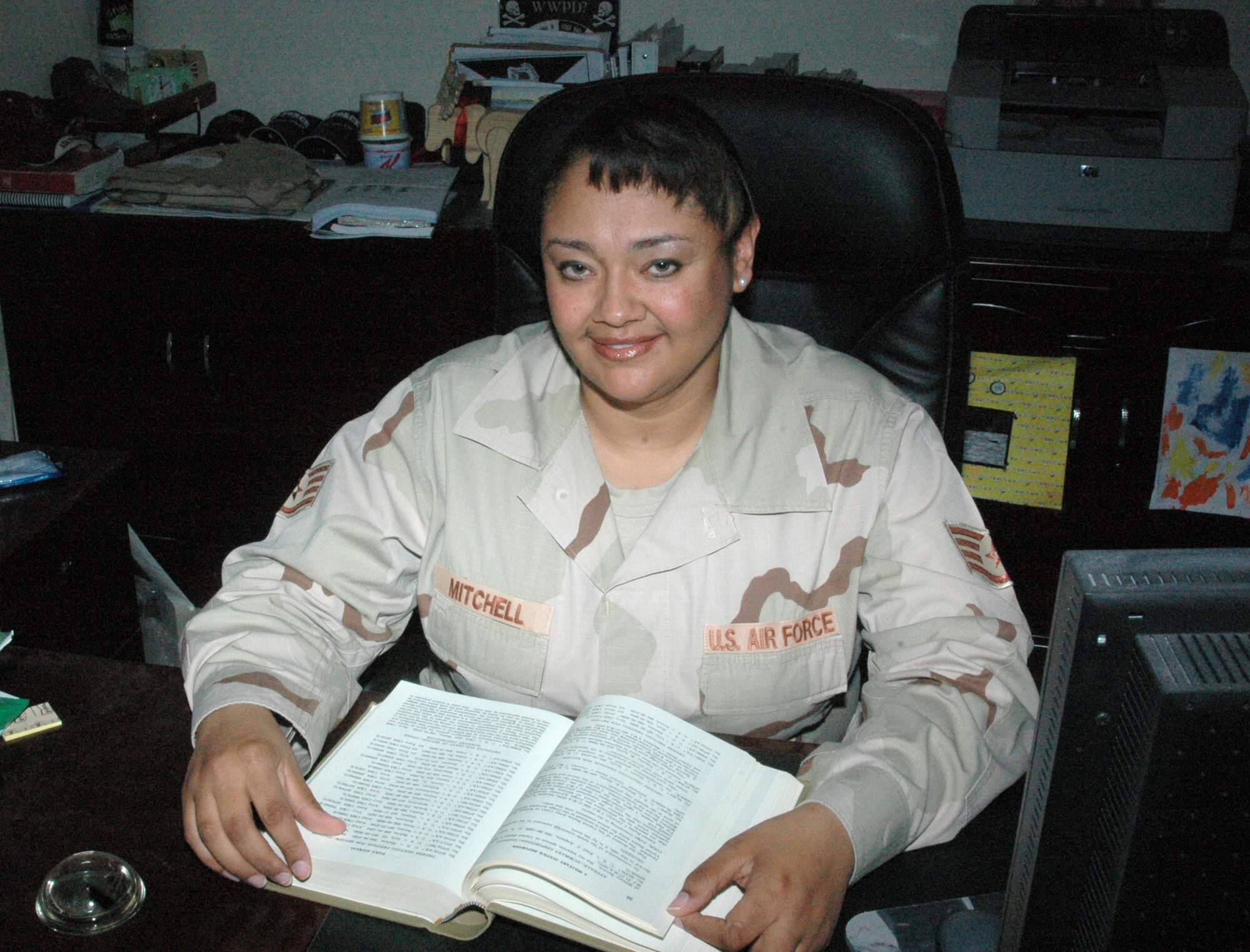 SOUTHWEST ASIA -- Staff Sgt. Pamela Mitchell is a defense paralegal with the 379th Air Expeditionary Wing Area Defense Counsel. She is one of the points of contact for Airmen who may need legal advice regarding Uniform Code of Military Justice violations. (U.S. Air Force photo by 2nd Lt. Tania Bryan)