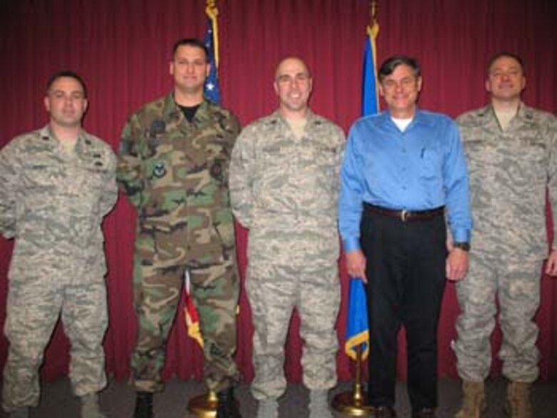 The 2007 Air Force Operational Test and Evaluation Center Communication and Information Assurance Team of the Year Award went to the AFOTEC Detachment 4 Information Assurance Team from Peterson AFB, Colo. Team members are: Capt. George E. Berry, Capt. Scott D. Brandimore, Capt. Richard M. Malerba, Capt. Jamila Robinson, Capt. Steven G. Waters, 1st Lt. Kelly Dean Pilarczyk, TSgt. Eric S. Parrott, and James W. Brouse.