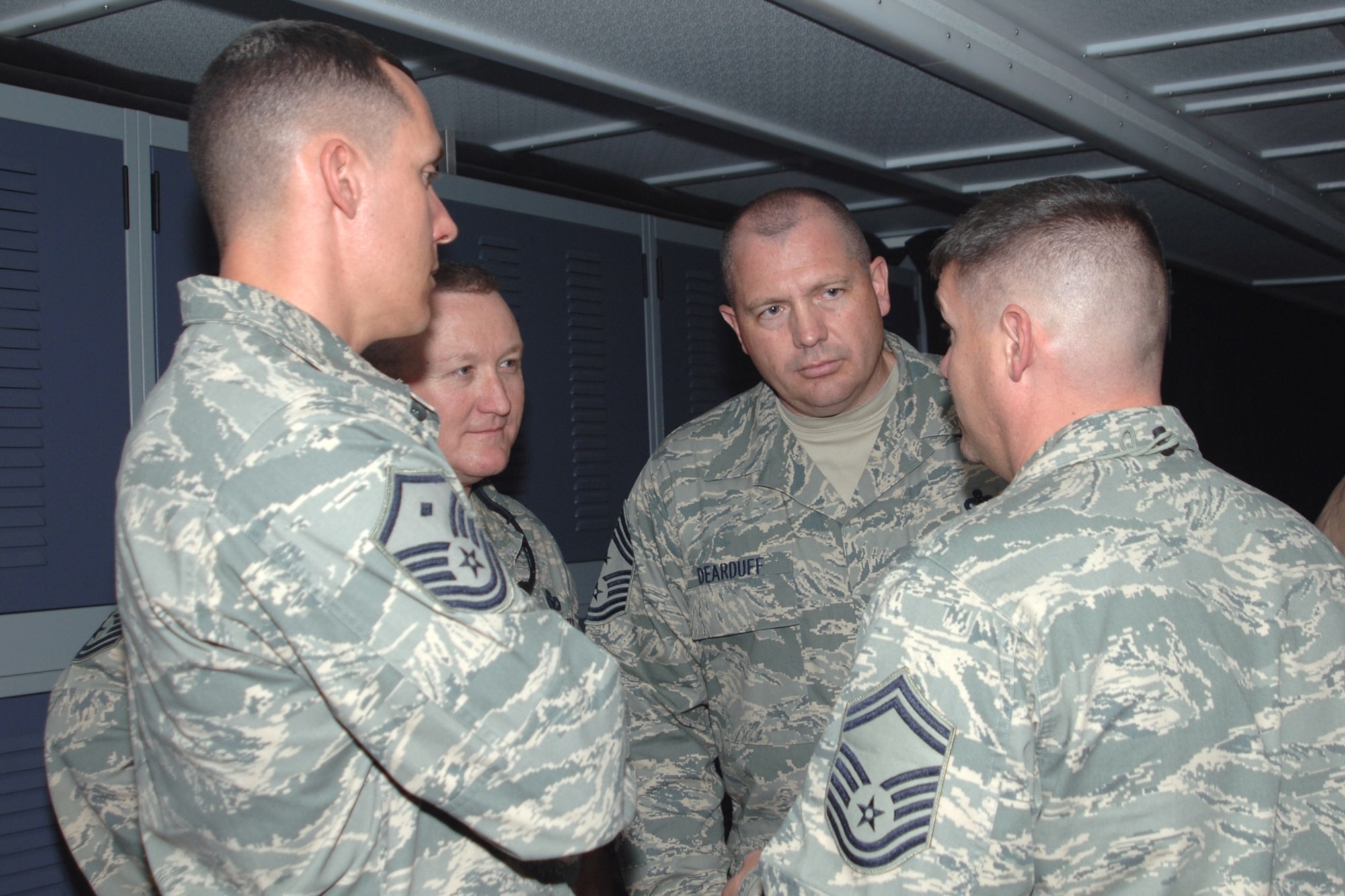 BALAD AIR BASE, Iraq -- The Command Chief for U.S. Air Forces Central, Chief Master Sgt. Scott Dearduff, and the Command Chief for the 332nd Air Expeditionary Wing, Chief Master Sgt. Paul Wheeler, meet with senior enlisted leaders assigned to the 727th Expeditionary Air Control Squadron, Senior Master Sgt. Patrick McMahon and Master Sgt. Steven Zellers during Chief Dearduff?s first trip to Balad since becoming the AFCENT command chief here, April 6. Chief Dearduff took the position in February; he also served as the 332 AEW command chief from July 2006-2007. Both Sergeants McMahon and Zellers are deployed from Eglin Air Force Base, Fla. (U.S. Air Force photo /Master Sgt. Heather Cabral)
