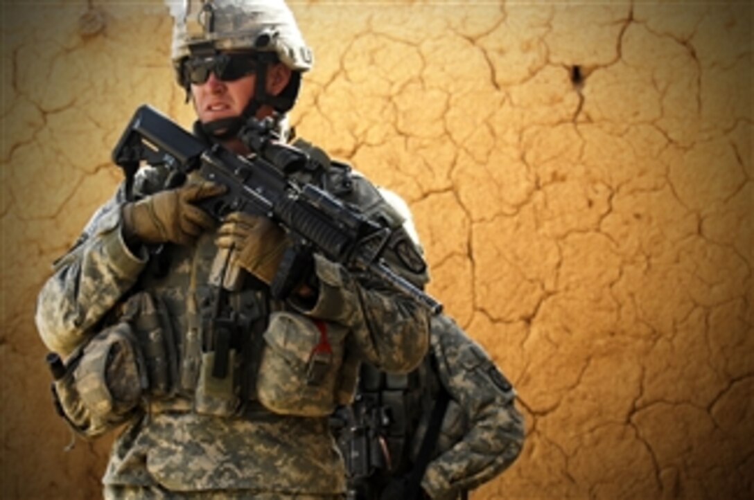 U.S. Army Sgt. Bryan Jenkins, from 2nd Battalion, 22nd Infantry Regiment, 10th Mountain Division, conducts a three-day air assault mission with fellow soldiers to search for weapons caches and high value insurgents in Upper Dugmut, Iraq, on April 3, 2008.  