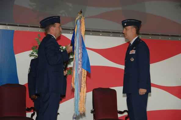 SEYMOUR JOHNSON AIR FORCE BASE, N.C. -- Colonel Jon Klaus, commander of the 6th Operations Group, presents the 911th Air Refueling Squadron guide-on to its new commander, Lt. Col. William Uptmor. The 911th ARS activated on April 12, 2008 and is the new active associate with the 916th Air Refueling Wing, Air Force Reserve. U.S. Air Force photo/TSgt. Gillian Albro
