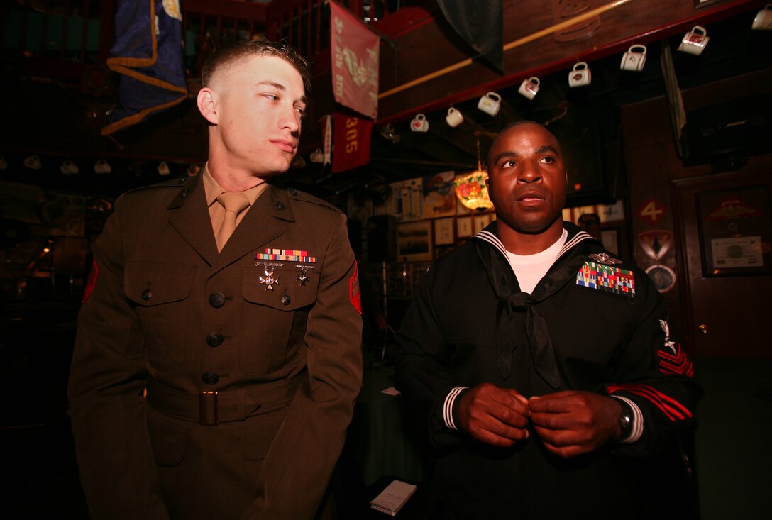 – Cpl. John P. Kopek (left), an infantryman who served as part of a military transition team in Ramadi, Iraq, meets Petty Officer 1st class Vincent Soto, a corpsman with 2nd Marine Division, at the first ever American Hero of the Year Awards at Sywanyks Scarlet & Gold Traditions nightclub, April 11. Soto and Kopek were two of the five service members selected from all East Coast operational commands. Kopek, 22, was the youngest honoree, and Soto was the only sailor.