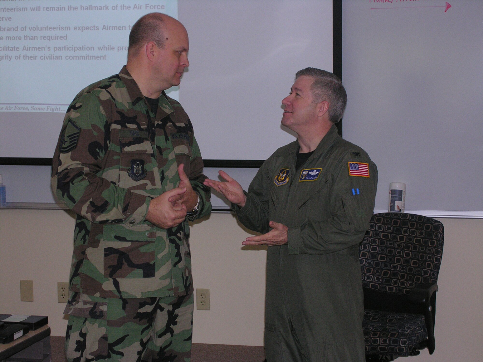 SEYMOUR JOHNSON AIR FORCE BASE, N.C. -- Col. Keith Kries (right), vice commander for 4th Air Force, talks with Master Sgt. Rodney Hage from headquarters Air Force Reserve Command. Sergeant Hage handles the Human Resource Development Council for the command and was at the 916th Air Refueling Wing to deliver HRDC 101 training to nearly 20 reservists. The training focused on basic functions of running an HRDC council such as charters, diversity, history of the program, outreach efforts, marketing and structure. The 916th established a council many years ago, but more recently has become active in developing the council role's in the wing and furthering its goals. The council taps into existing programs to better support wing members and supports the wing commander in force development, diversity, mentoring, retention, recruiting, community outreach, assignments and promotion opportunities. For more information about the HRDC contact Lt. Col. David Herndon.