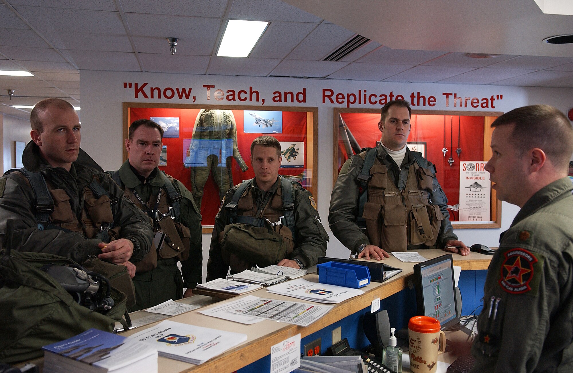 Maj. Paul Dambrauskas briefs the 18th Aggressor Squadron pilots on today's mission April 11, 2008, at Eielson Air Force Base, Alaska. During RED FLAG-Alaska 08-2 the 18th AGRS acts as the opposing force employing enemy tactics while engaging in aerial combat over the Pacific Alaskan Range Complex. Major Dambrauskas is a pilot with the 18th AGRS. (U.S. Air Force Photo/Airman 1st Class Jonathan Snyder)