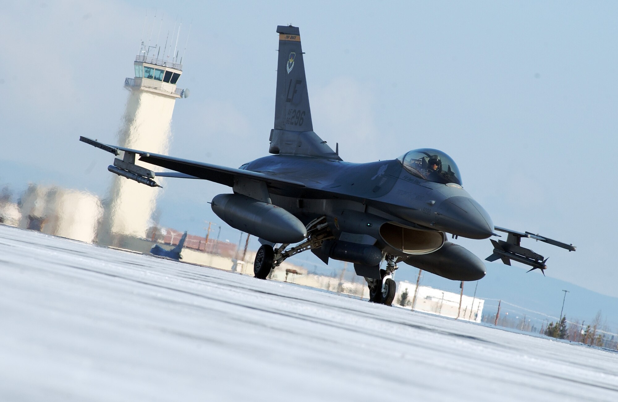 A F-16 Fighting Falcon taxis down the flightline at Eielson Air Force Base, Alaska April 11, 2008. RED FLAG-Alaska 08-2 is a Pacific Air Forces command directed field training exercise which provides joint offensive counter-air, interdiction, close air support and large force employment training in a simulated combat environment. The aircraft is assigned to Luke Air Force Base, Ariz. (U.S. Air Force Photo/Airman 1st Class Jonathan Snyder)