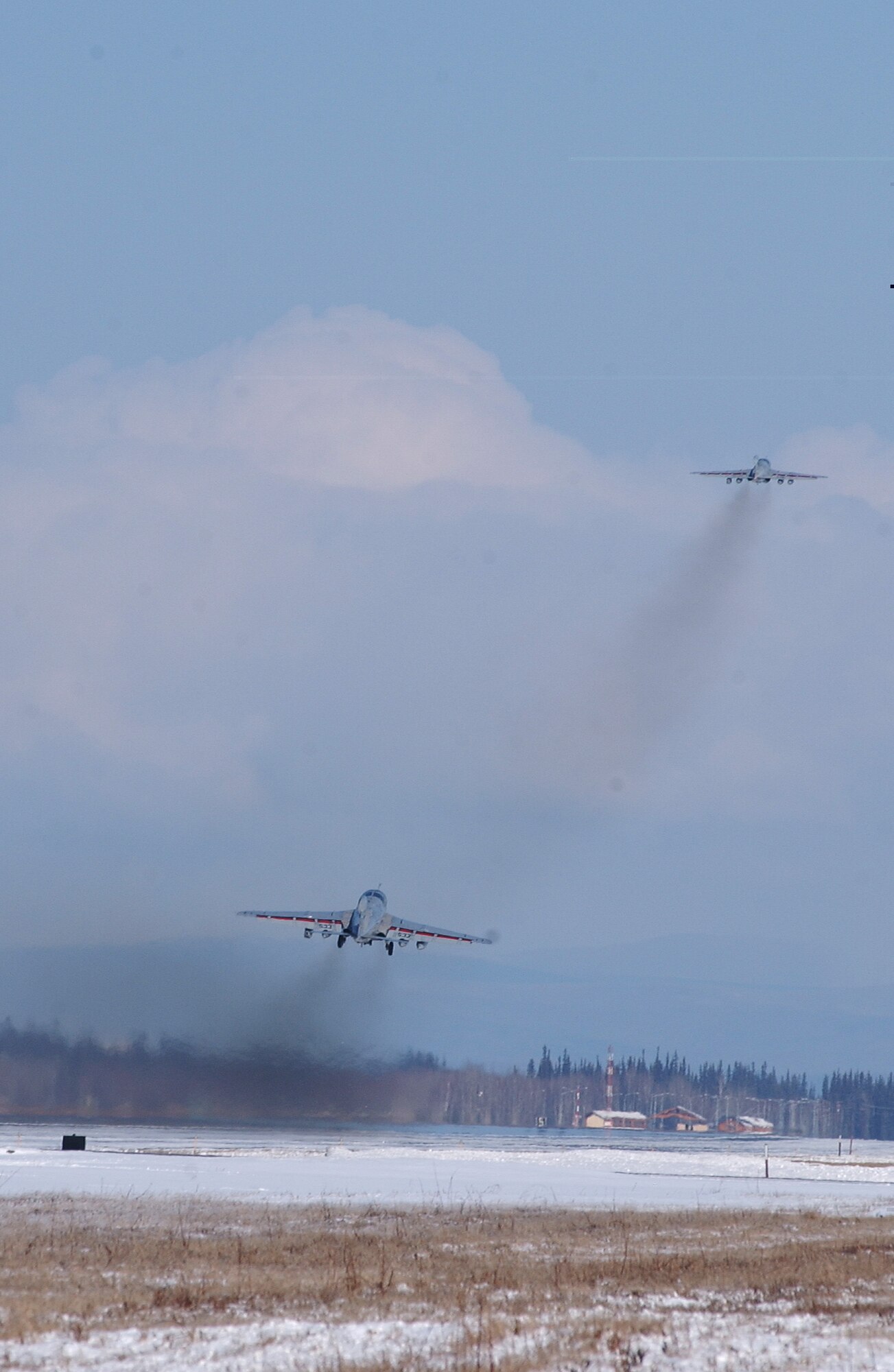 Two EA-6B Prowlers takes off from the runway at Eielson Air Force Base, Alaska April 11, 2008. RED FLAG-Alaska 08-2 is a Pacific Air Forces command directed field training exercise which provides joint offensive counter-air, interdiction, close air support and large force employment training in a simulated combat environment. The aircraft is assigned to Naval Air Station Whidbey Island. (U.S. Air Force Photo/Airman 1st Class Jonathan Snyder)
