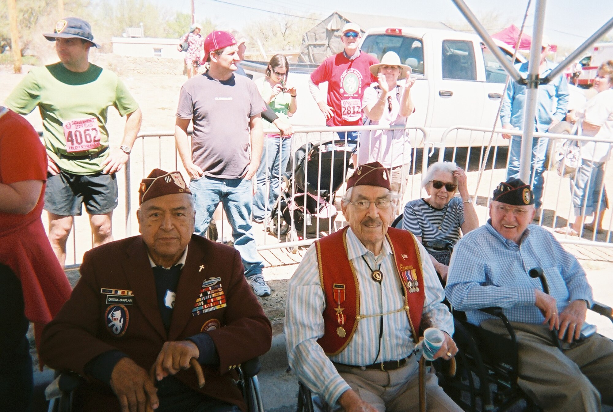 (Left to right): Abel Ortega, from San Antonio, Texas, Evans Garcia of Albuquerque, N.M. and Ben Steele or Billings, Mo., each survivors of the 1941 Bataan Death March, take a break from the New Mexico sun during the 19th annual Bataan Memorial Death March at White Sands Missile Range. (Courtesy photo)