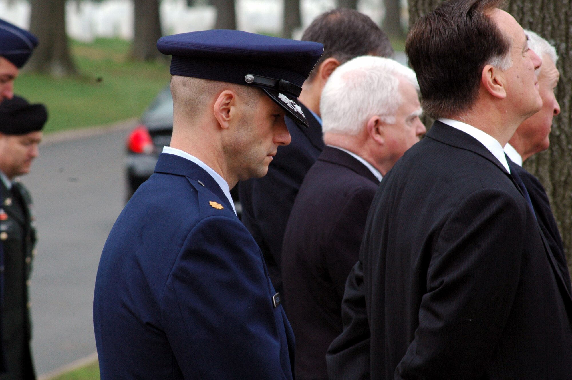 Maj. Phil Heseltine participates in the funeral for Maj. Robert F. Woods April 9 at Arlington National Cemetery in Virginia. Earlier that day, Major Heseltine presented the prisoner of war/missing in action bracelet to the family of Major Woods, whose name is on the bracelet that Major Heseltine wore for 18 years. Major Heseltine is the executive officer for the Air Force Expeditionary Center commander at Fort Dix, N.J. (U.S. Air Force photo/Tech. Sgt. Scott T. Sturkol) 

