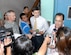 Col. (Dr.) Mike Sigmon, Joint Task Force-Bravo's medical element commander, Lt.  Col. (Dr.)  Charles Henderson,visiting urologist, and Dr. Ricardo Aviles, MEDEL medical officer respond to reporters questions during an impromptu press conference at Hospital Escuela April 11.  While working out of Hospital Escuela in Tegucigalpa March 28-April 13, the 11-person team, made up of personnel from Brooke and Madigan Army Medical Centers, operated on more than 35 patients treating problems ranging from obstructions to malignancies and problems associated with inflammatory diseases.