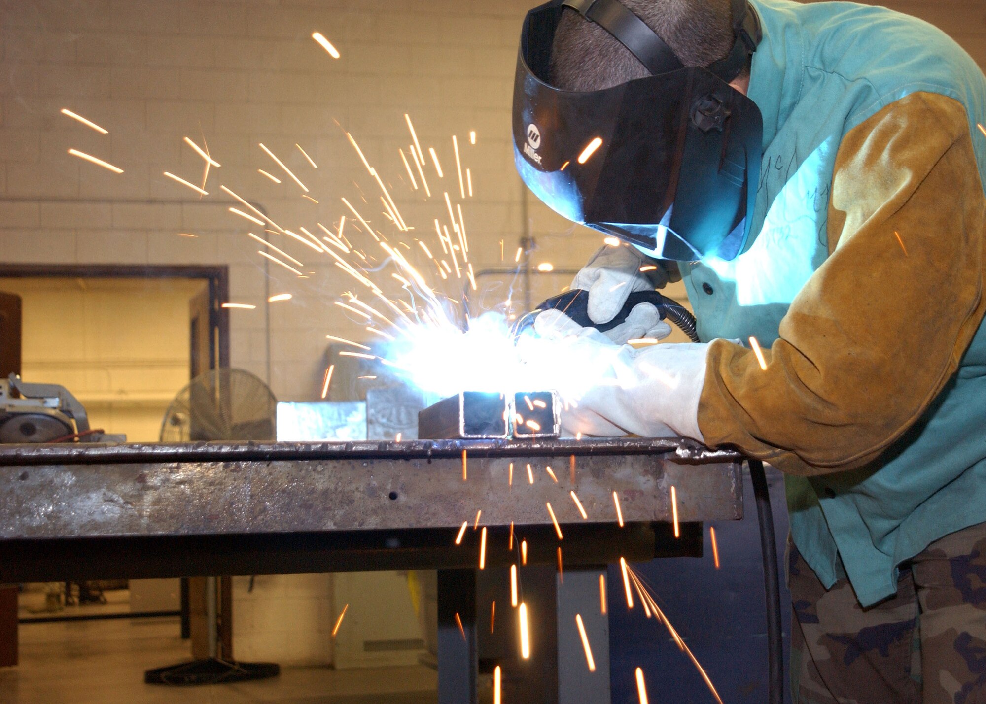 CANNON AIR FORCE BASE, N.M.-- Staff Sgt. Joshua McCurdy, 27th Special Operations Equipment Maintenance Squadron, welds a piece of metal used for machines and aircraft on April 9. The Maintainer Professional of the Year banquet on April 26 will recognize the base's best maintainers. (U.S. Air Force photo by Airman Maynelinne De La Cruz)