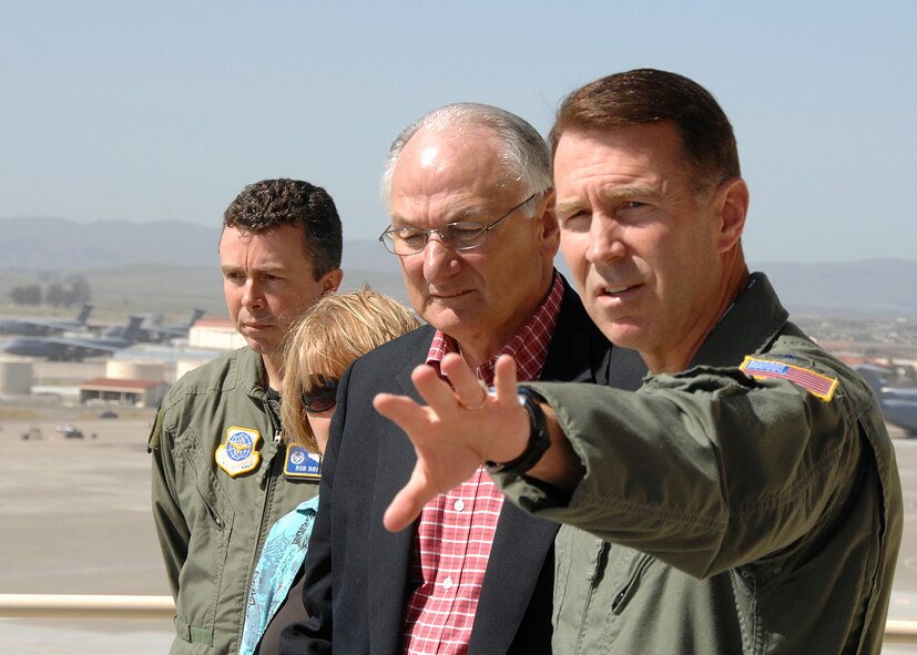 Dr. James I. Finley, Deputy Under Secretary of Defense for Acquisition and Technology and his spouse, Mrs. Sharon Finley, are briefed on the mission of Travis Air Force Base by Col. Steven J. Arquiette, 60 Air Mobility Wing Commander, during a tour of the base air traffic control tower. Also pictured is Lt Col Robert A. Brisson, 60 Operations Support Squadron Commander (left rear). Travis AFB CA U.S. Air Force Photo by David W. Cushman, DAFC