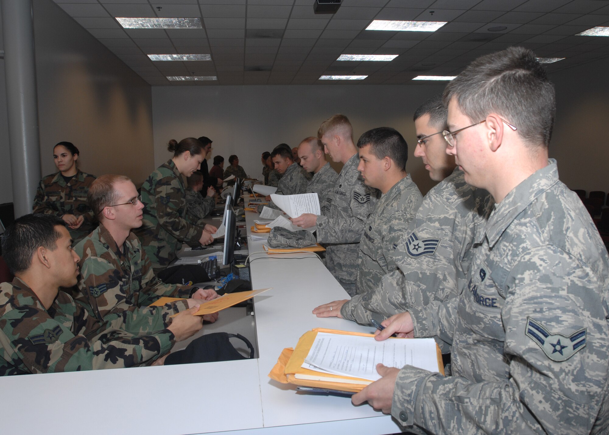 WHITEMAN AIR FORCE BASE, Mo.- Airmen of the 509th Logistics Readiness Squadron in-process with members of the 509th Medical Group at the Whiteman Deployment Center April 14. The Airmen are returning from their deployment to Southeast Asia. (U.S. Air Force photo/Tech. Sgt. Samuel A. Park)