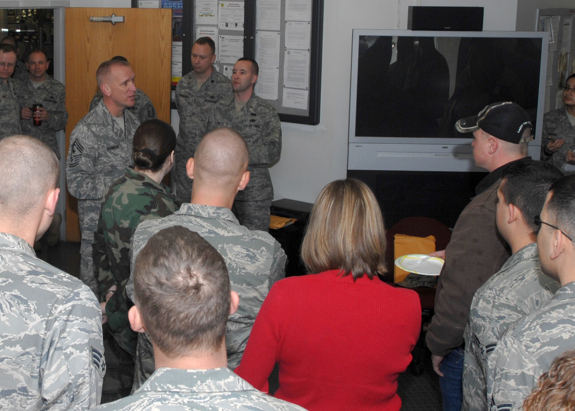 WHITEMAN AIR FORCE BASE, Mo.- Chief Master Sgt. Brian S. Hornback, 509th Bomb Wing Command Chief Master Sergeant , welcomes back Airmen from the 509th Logistics Readiness Squadron from their deployment to Southeast Asia April 14. (U.S. Air Force photo/Tech. Sgt. Samuel A. Park)
