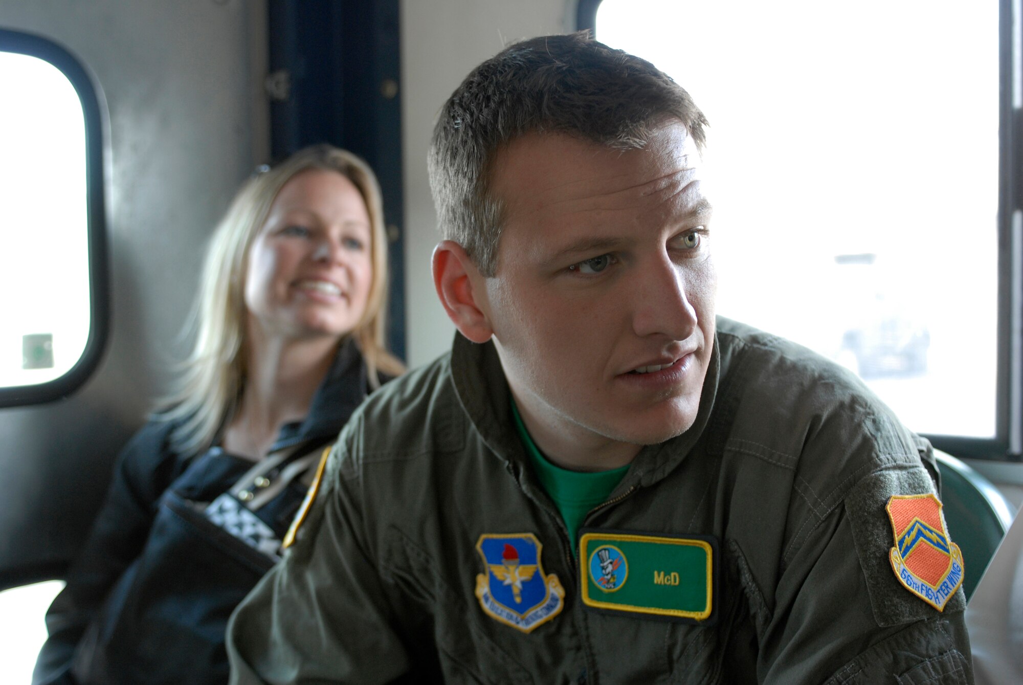 NASCAR driver Michael McDowell departs the 310th Fighter Squadron for the flight line to attend egress training April 9. During the training he learned how the safety egress and how safety equipment aids in protecting pilots. (U.S. Air Force photo/Staff Sergeant Christopher Hummel)