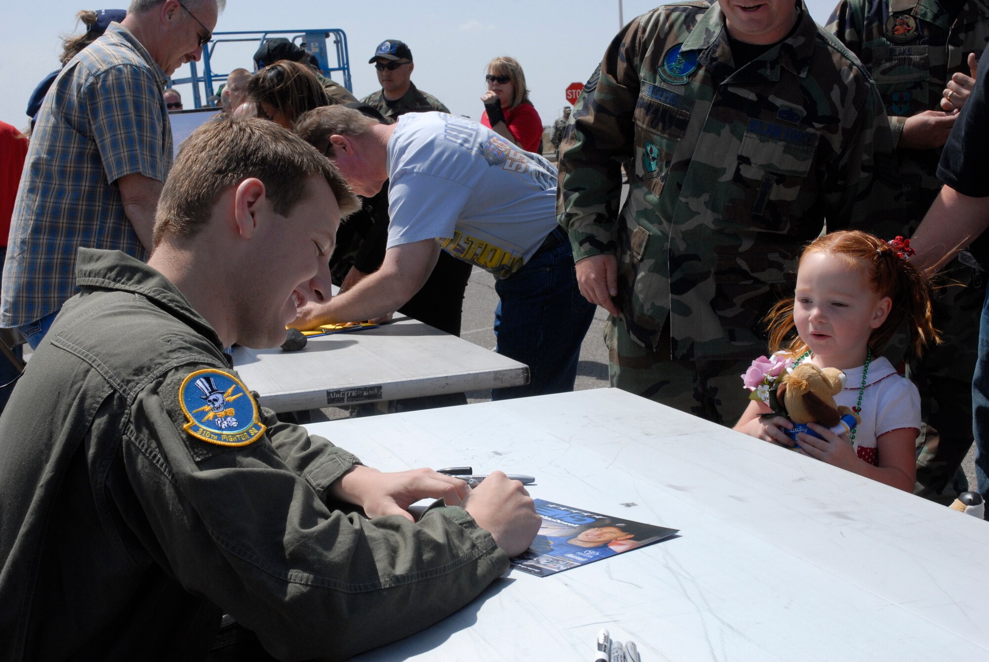 NASCAR driver Michael McDowell speaks to Luke members, April 9 about his recent crash, visit to the base and upcoming race. Mr. McDowell received an orientation flight in an F-16 after meeting and speaking to Luke members. (U.S. Air Force photo/Staff Sergeant Christopher Hummel)