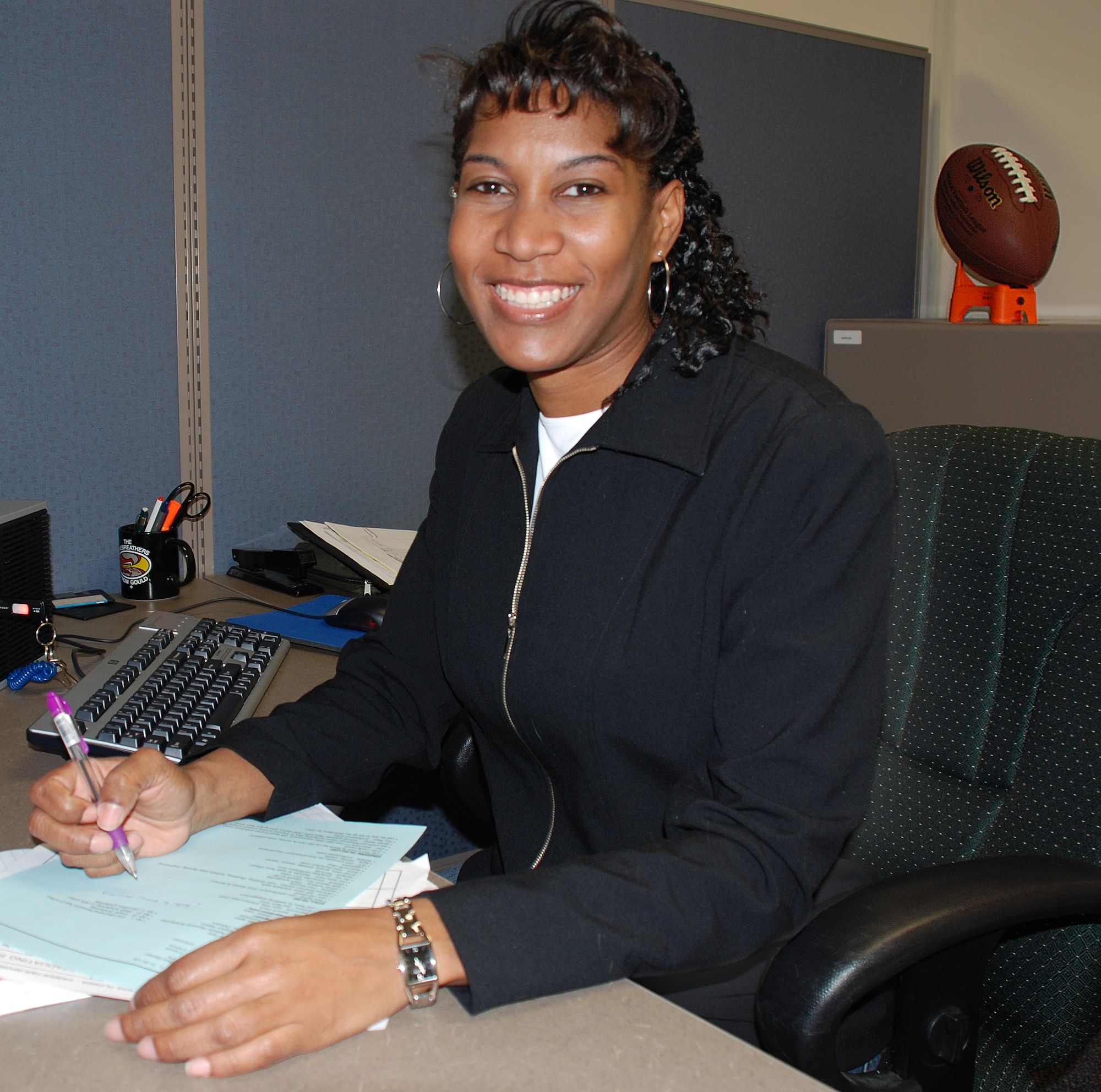 Robyn Bradford, a Consortium Research Fellows Program student with the 711th Human Performance Wing, Human Effectiveness Directorate, is one of several Dayton Diamonds women's professional football players with a connection to the military and Wright-Patterson Air Force Base. (Photo by Chris Gulliford AFRL/RH)