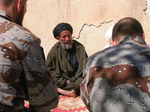 A village elder listens as other elders communicate with Marines of 2nd Battalion, 7th Marine Regiment, 1st Marine Division, who were accompanied on their visit to the Golestan District by Spanish and Italian troops, other U.S service members, and members of the International Security Assistance Force, Afghanistan Regional Security Integration Command West, Regional Command West and Police Mentoring Team on their visit to the Golestan District. Based out of Twentynine Palms, Calif., 2/7 is a reinforced light infantry battalion operating in Afghanistan on a 210-deployment to mentor, train and advise the Afghanistan National Police.