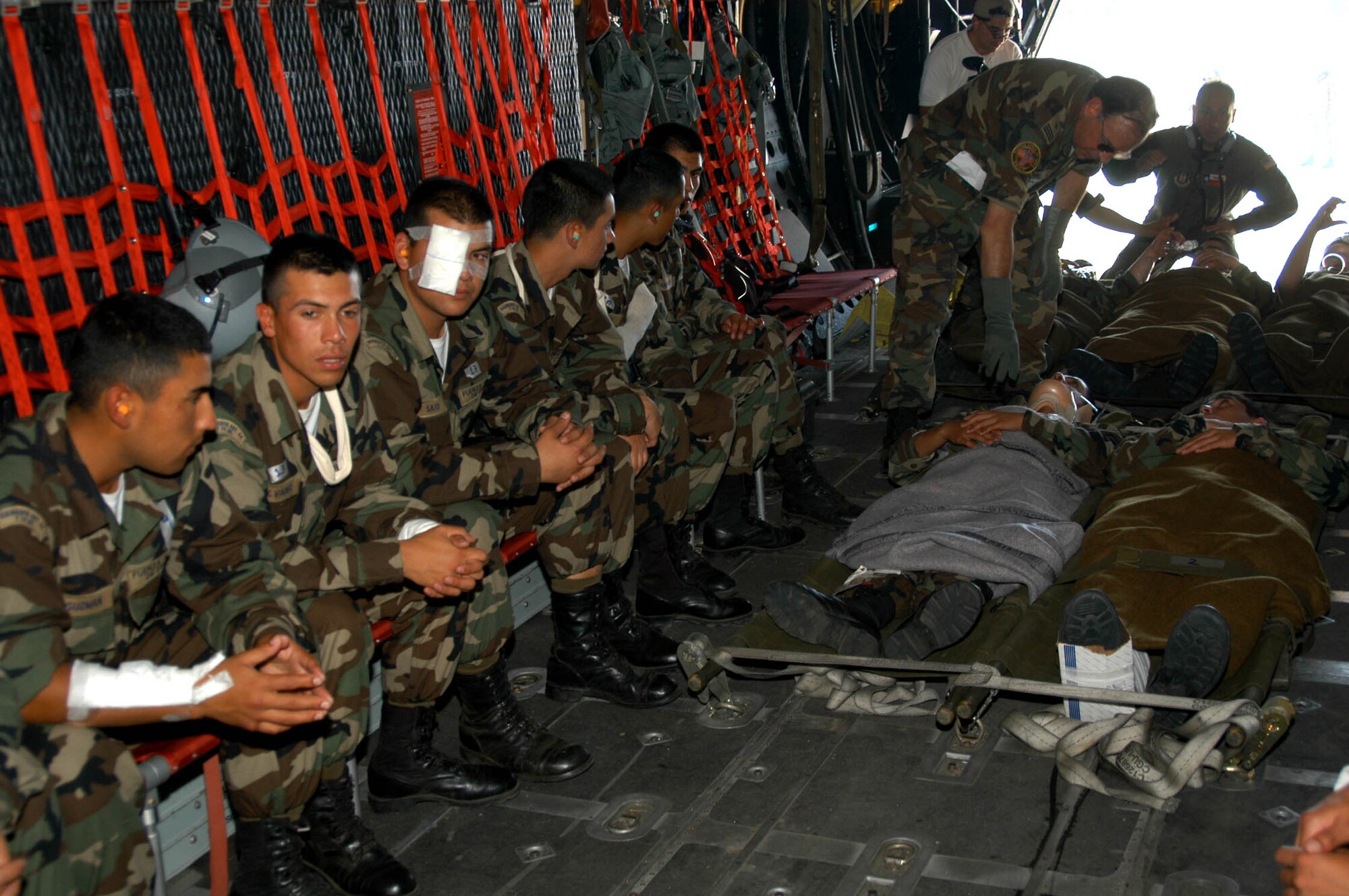 Simulated patients are transported via a U.S. HC-130 Hercules, assigned to the 48th Rescue Squadron at Davis-Monathan Air Force Base, Ariz., after being rescued by U.S. and Chilean Air Force pararescue personnel participating in NEWEN a three-day combined military exercise, April  8-10. The NEWEN exercise, focused on refueling operations, search and rescue tactics and dissimilar aircraft maneuvers with members of the Chilean Air Force. (photo by U.S. Embassy- Chile)