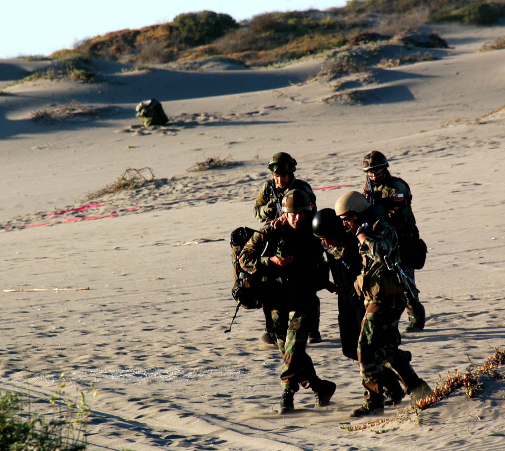 Simulated patients are rescued by U.S. and Chilean Air Force pararescue personnel during NEWEN, a combined military exercise that took place in Quintero, Chile, April 8-10.  The NEWEN exercise focused on refueling operations, search and rescue tactics and dissimilar aircraft maneuvers with members of the Chilean Air Force. 
(photo by U.S. Embassy- Chile)