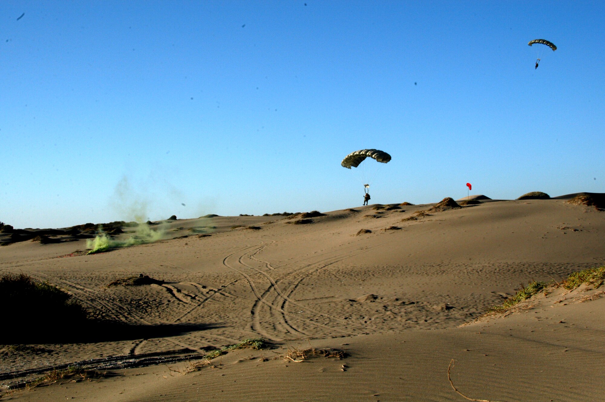 U.S. and Chilean Air Force pararescue personnel participate in a simulated casualty evacuation on the beaches of Quintero, Chile during NEWEN, a three-day combined military exercise, April 8-10.  The NEWEN exercise focused on refueling operations, search and rescue tactics and dissimilar aircraft maneuvers with members of the Chilean Air Force.