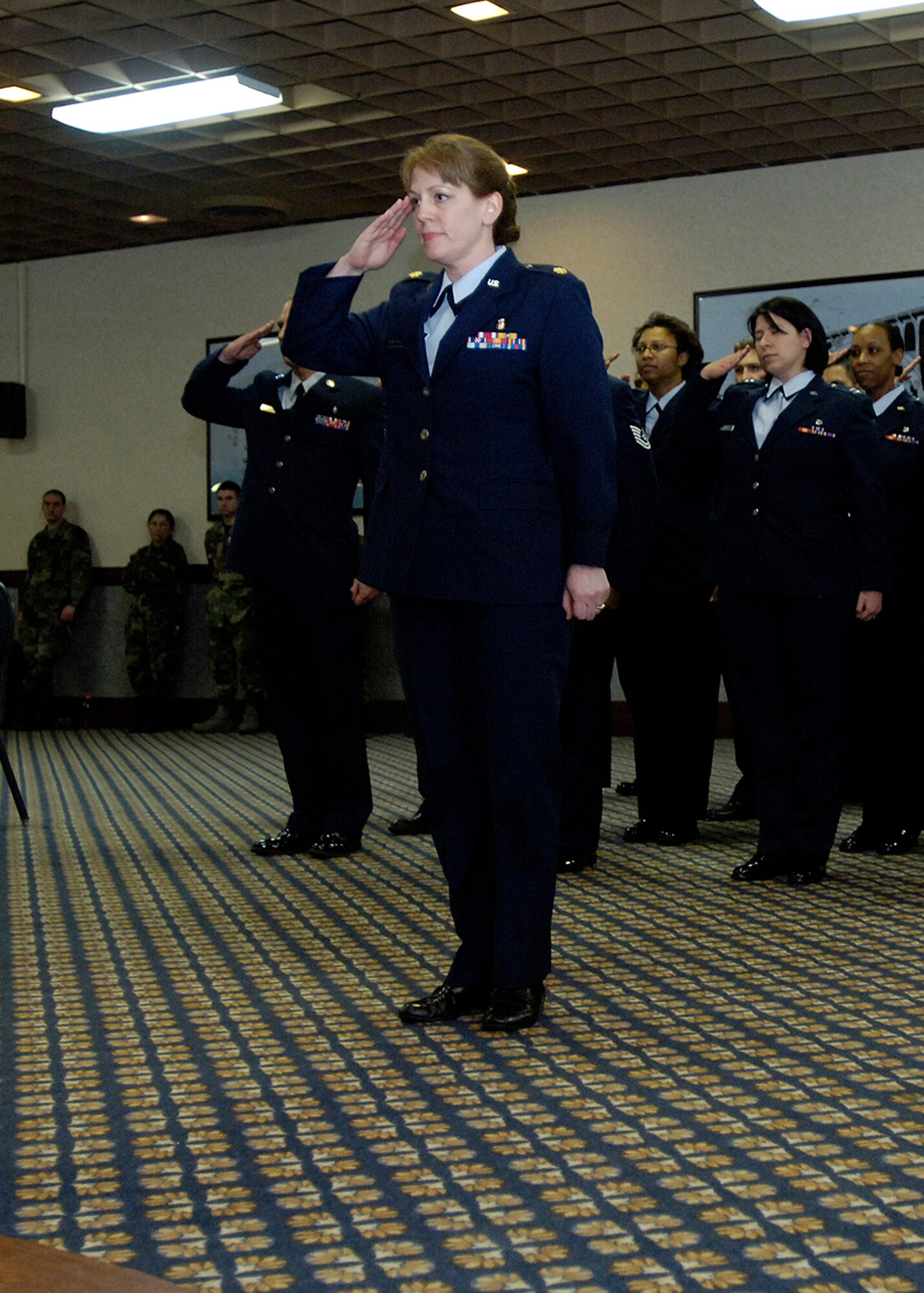FAIRCHILD AIR FORCE BASE, Wash. – The 92nd Medical Operations Squadron, presents Lt. Col. Maureen Harback, 92nd Medical Operations Squadron commander, with her first salute during the 92nd MDOS change-of-command ceremony April 11. (U.S. Air Force photo/Senior Airman Eunique Stevens)