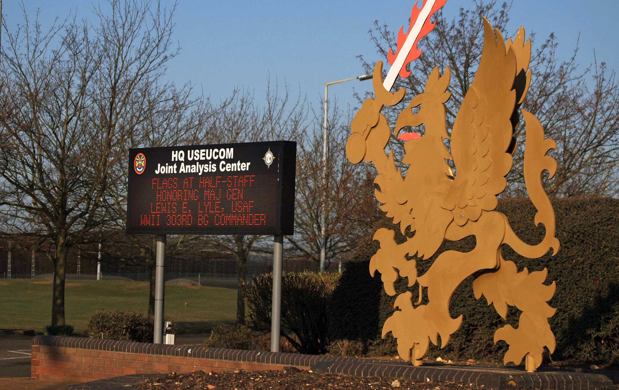 The marquee of the JIOCEUR Analytic Center at RAF Molesworth announces the flying of the flag of the United States and the ensign of the Royal Air Force at half-staff as a tribute by two grateful nations to the service of Major General Lewis E. Lyle, U. S. Air Force during World War II.  (U.S. Air Force photo by Staff Sgt. Jocelyn L. Rich)