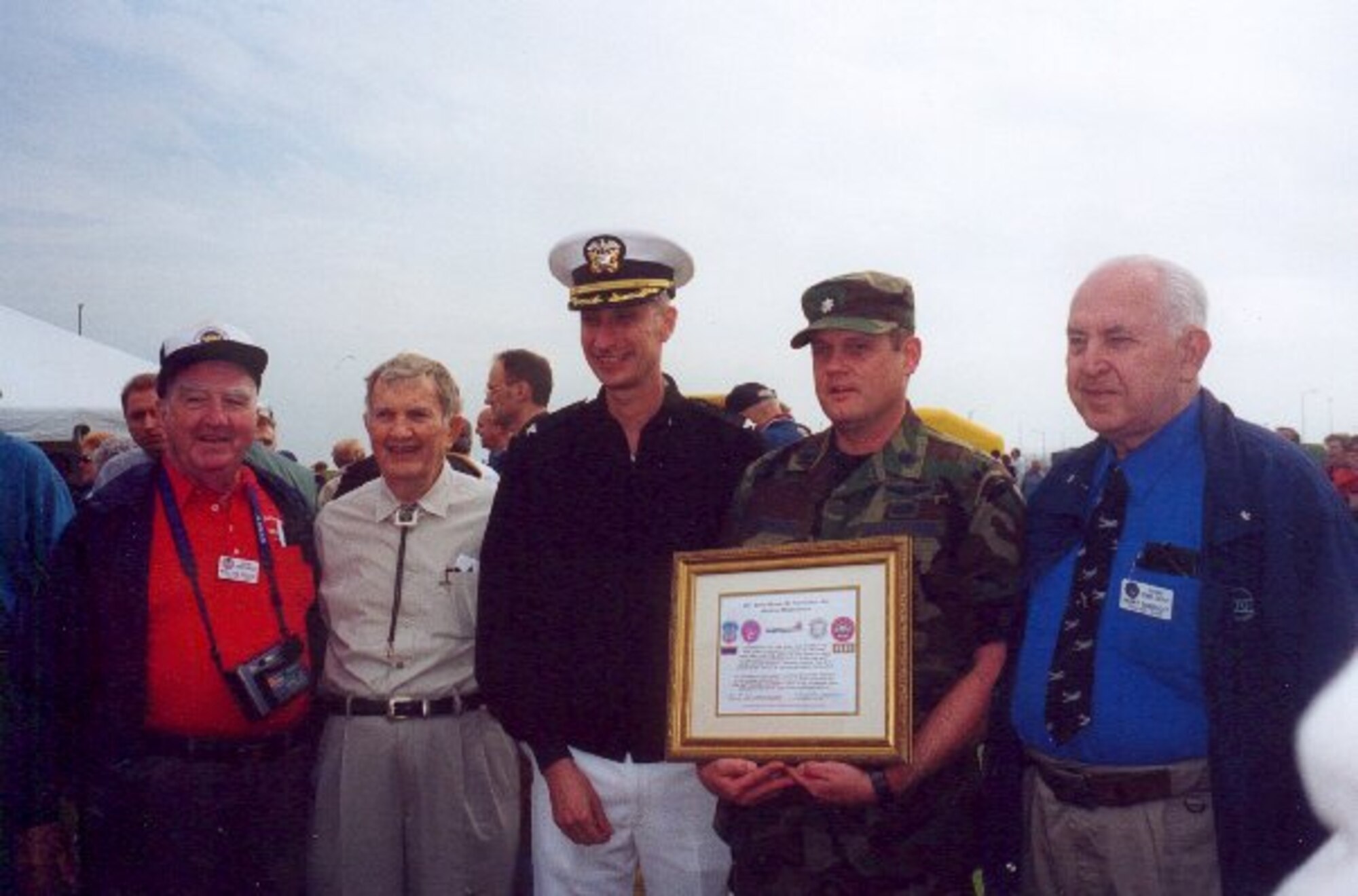 Maj Gen Lyle's last visit to Molesworth June 4, 2000 for the dedication of the 303rd Bomb Group Heavy Memorial.  The 30rd Bomb Group Association presented the "Might in Flight Award" to then JAC Commander, Navy Captain Michael A. Noll.  From left:
William Roche (303rdBGA President), Maj. Gen. Lewis Lyle, Capt. Michael A. Noll (JAC Commander),
Lt.Col. Carl E. Zimmerman (423rd Air Base Sq Commander), Harry Gobrecht (U.S. Air Force Photo)

