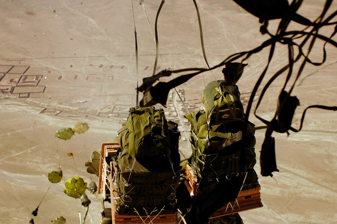 Forty bundles of humanitarian supplies are dropped from a C-17 Globemaster III using the Joint Precision Airdrop Delivery System to a drop zone April 13 in Afghanistan. The C-17 aircrew is from the 17th Airlift Squadron from Charleston Air Force Base, S.C. (U.S. Air Force photo/Master Sgt. Andy Dunaway)
