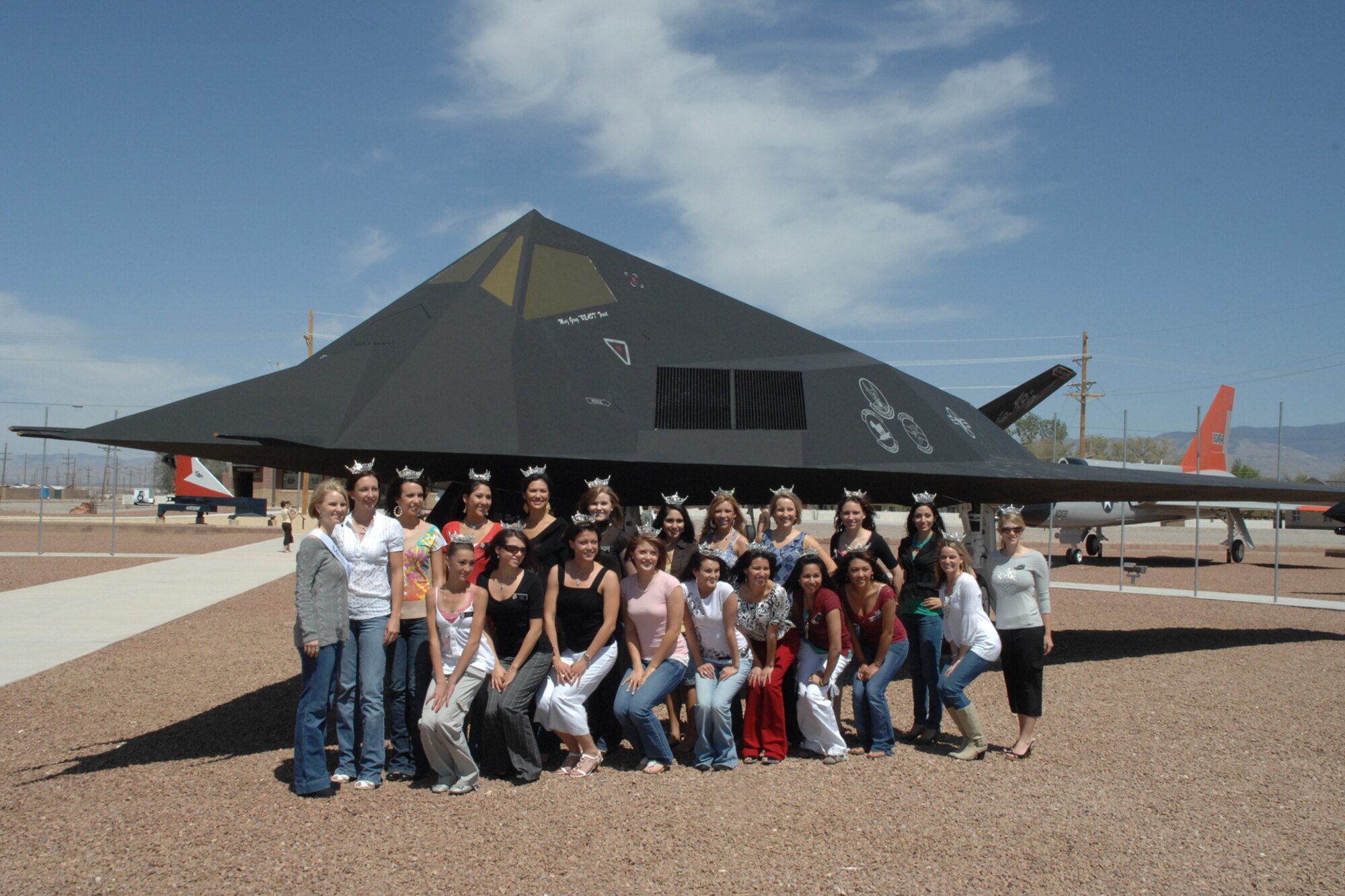 HOLLOMAN AIR FORCE BASE, N.M. --  Miss New Mexico pageant participants take a group in front of an F-117A static display here at Heritage Park. The Miss New Mexico hopefuls visited Holloman to attend a workshop covering an upcoming pageant on base. (U.S. Air Force photo/Airman 1st Class Jamal D. Sutter)