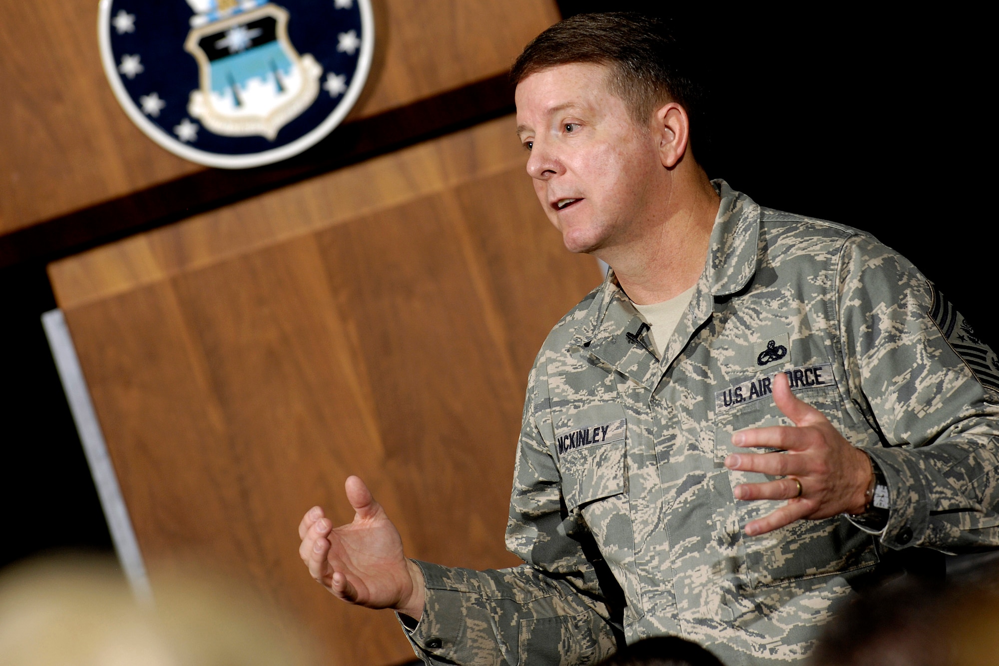 Chief Master Sgt. of the Air Force Rodney J. McKinley speaks before an enlisted call held April 10 in Arnold Hall at the U.S. Air Force Academy in Colorado. Chief McKinley visited Academy Airmen to brief on the Air Force's top priorities. (U.S. Air Force photo/Mike Kaplan) 

