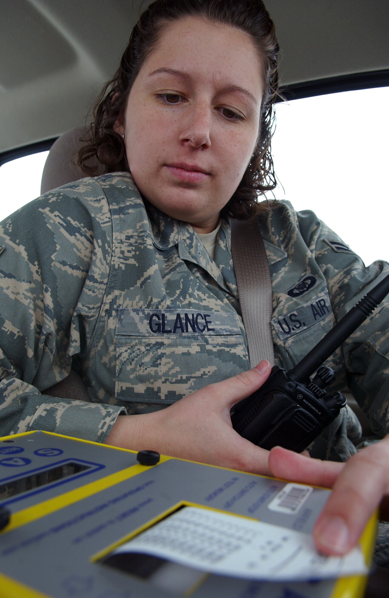 Airman 1st Class Kathyrn Glance checks the results of a runway condition reading test at Eielson Air Force Base, Alaska April 10, 2008. During RED FLAG-Alaska the flightline is active with dozens of aircraft. However before any aircraft can move during inclement weather, Airmen must conduct a series of tests to determine if the current airfield conditions are safe for operations. She is assigned to the 354th Operation Support Squadron. (U.S. Air Force Photo/Airman 1st Class Jonathan Snyder)