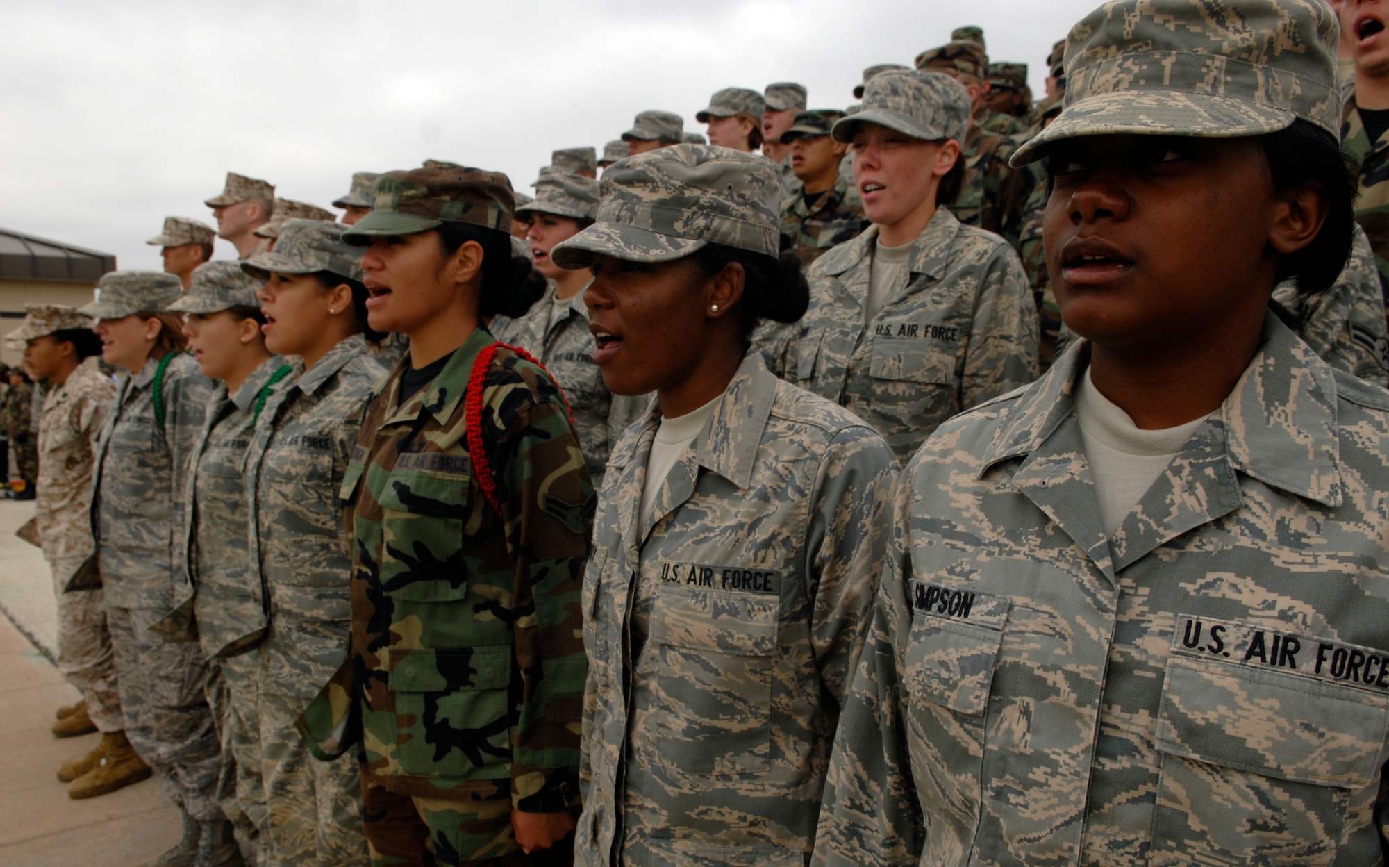 Airmen from the 17th Training Group sing loud and proud along with the Air Force song during the Pass in Review. (U.S. Air Force photo by Senior Airman Kamaile Chan)