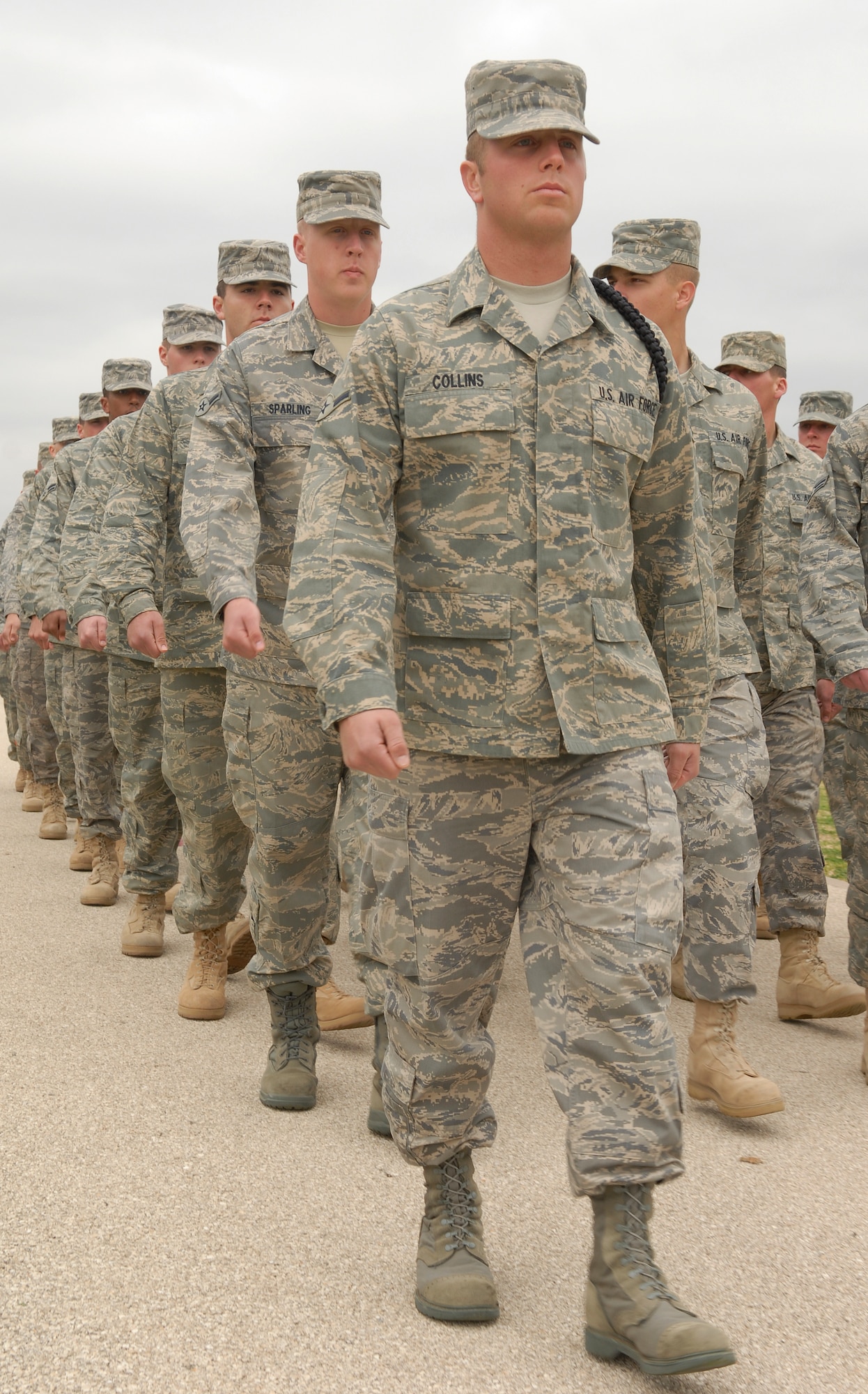 Airmen from the 17th Training Group march during the Pass in Review wearing the new Airman Battle Uniform. (U.S. Air Force photo by Senior Airman Kamaile Chan)