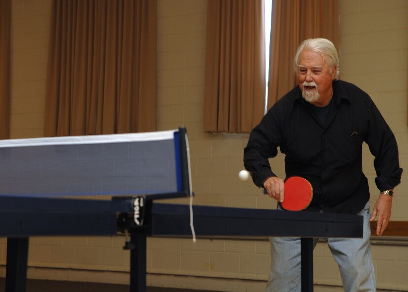 HOLLOMAN AIR FORCE BASE, N.M. ? Wayne Jameson, a retired Army sergeant major, participates in a ping pong tournament at the Community Center here April 11. The Community Center holds many different activities, tournaments and clubs for Airmen to participate in. (U.S. Air Force photo by Airman Sondra M. Wieseler)