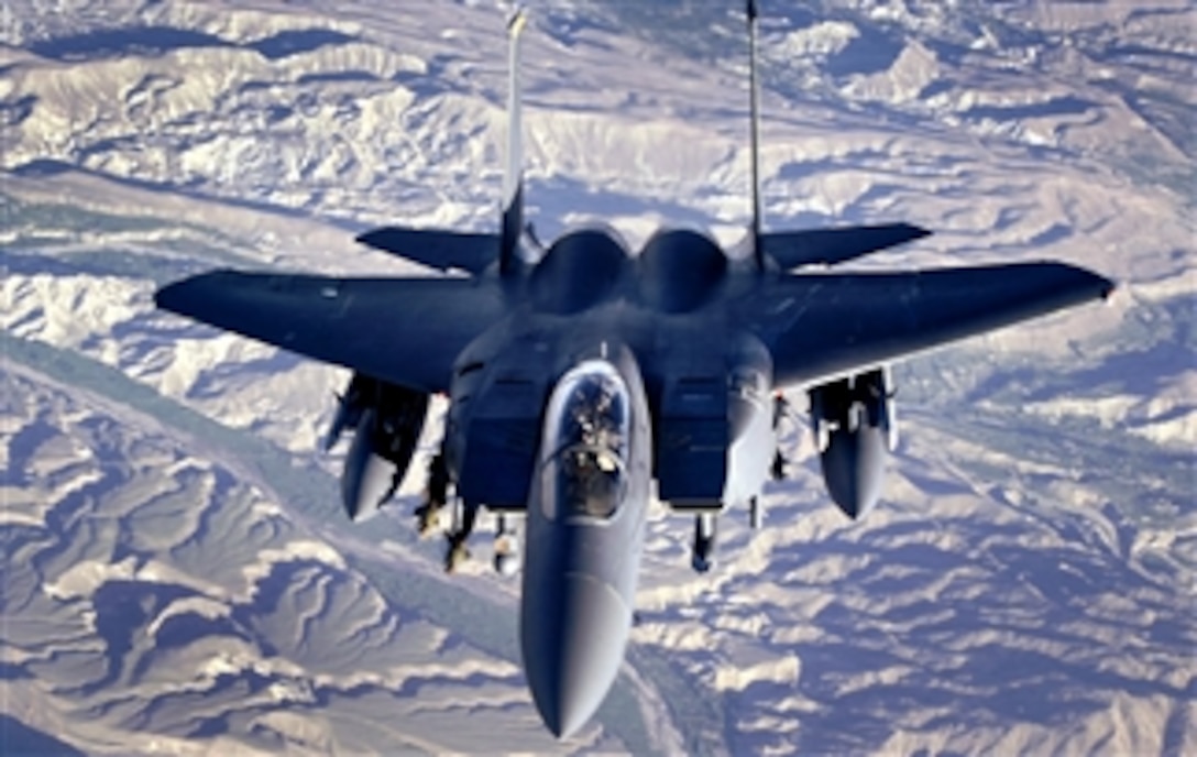 A U.S. Air Force pilot aboard an F-15E Strike Eagle conducts a mission over Afghanistan, April 14, 2008. The F-15 frequently performs shows of force to deter enemy activities and protect coalition forces on the ground in Afghanistan and Iraq.