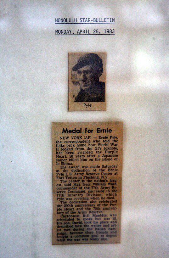 HONOLULU -- A news clipping, on display in the visitor center at the National Memorial Cemetery of the Pacific (Punchbowl), from a 1983 Honolulu Star Bulletin tells of Ernie Pyle recieving the Purple Heart, 38 years after his death.