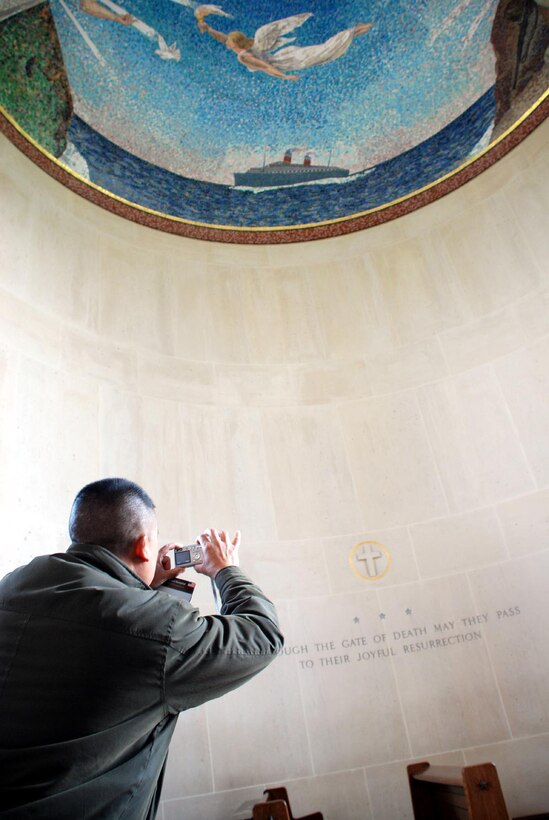 Lt. Col. Van Nguyen, Marine Forces Europe assistant chief of staff personnel, takes a photograph inside the chapel at the Normandy American Cemetery and Memorial. Nguyen was part of a group of MFE Marines who recently traveled to Normandy for a professional military education study of Operation Overlord, the Allied invasion of Nazi occupied France in 1944.
