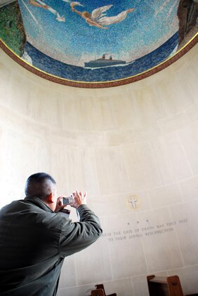 Lt. Col. Van Nguyen, Marine Forces Europe assistant chief of staff personnel, takes a photograph inside the chapel at the Normandy American Cemetery and Memorial. Nguyen was part of a group of MFE Marines who recently traveled to Normandy for a professional military education study of Operation Overlord, the Allied invasion of Nazi occupied France in 1944.
