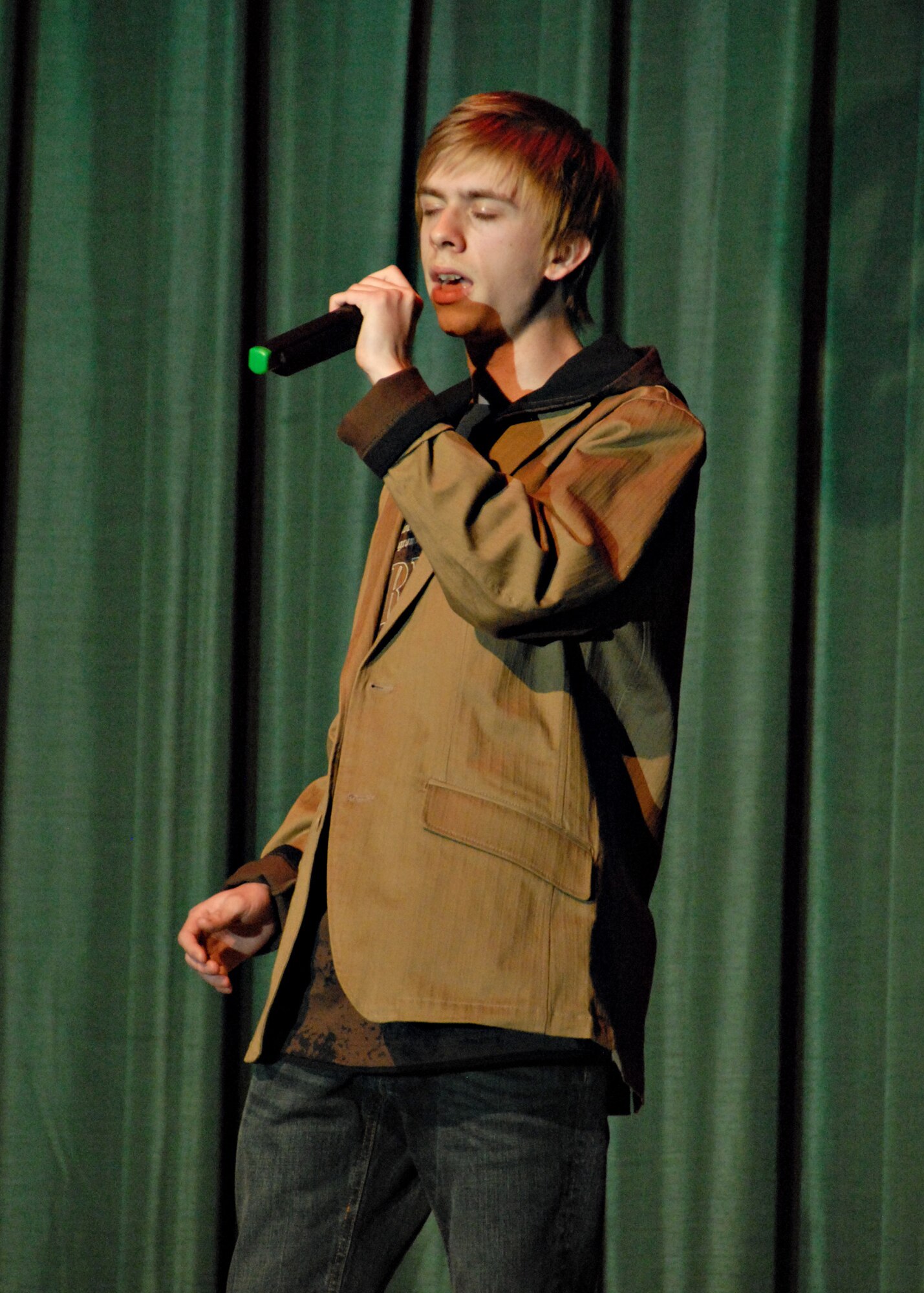 MISAWA AIR BASE, Japan -- Danny Blayer performs O-Town's "All or Nothing" during Misawa Idol April 5, 2008. Unfortunately, Danny and two other contestants did not advance to the next round, but still may come back as a "wild card" during the finals. (U.S. Air Force photo by Tech. Sgt. Russell McBride)