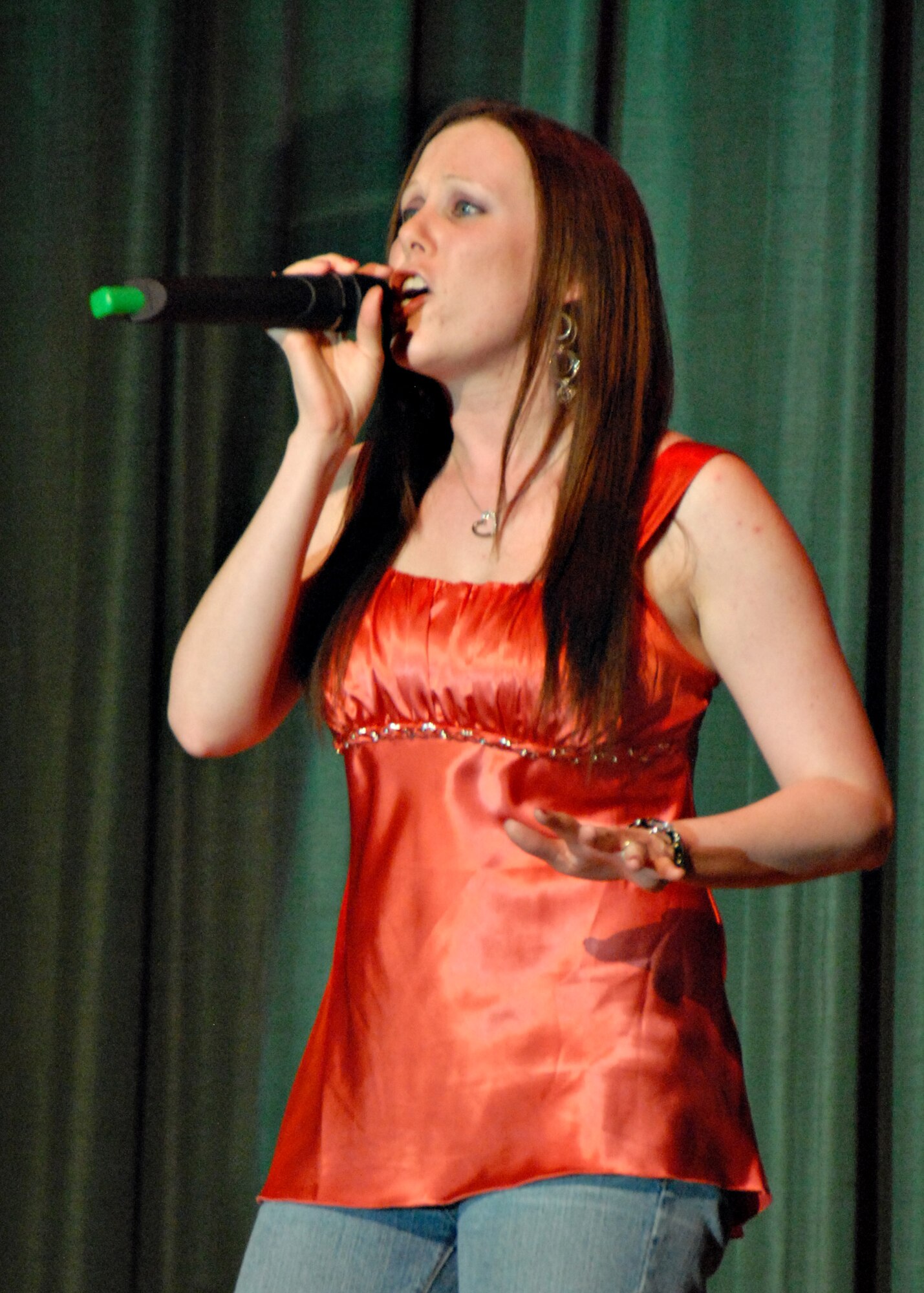 MISAWA AIR BASE, Japan -- Kristin Walters sings Reba McEntire's "Why Haven't I Heard From You" during the first round of Misawa Idol April 5, 2008. Ms. Walters advances to the next round on April 19. (U.S. Air Force photo by Tech. Sgt. Russell McBride)