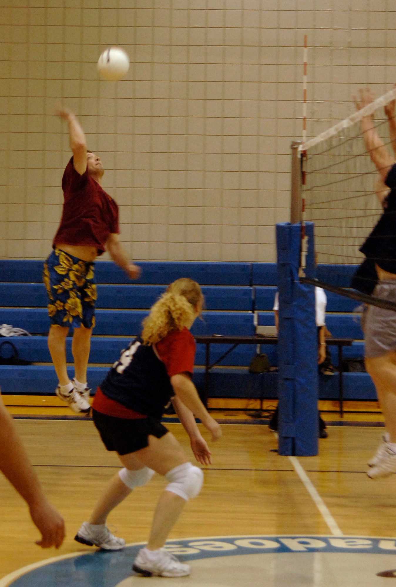 MCCONNELL AIR FORCE BASE, Kan. -- Tech. Sgt. Dennis Sunderland, 22nd Medical Group, sends a powerhouse of a spike to the 22nd Security Forces team at the fitness center here, April 15.  The 22nd MDG shut out the 22nd SFS 25-16, 25-11, putting the MDG record to four wins and zero losses this season.  (Photo by Staff Sgt. Ronald Lafosse)
