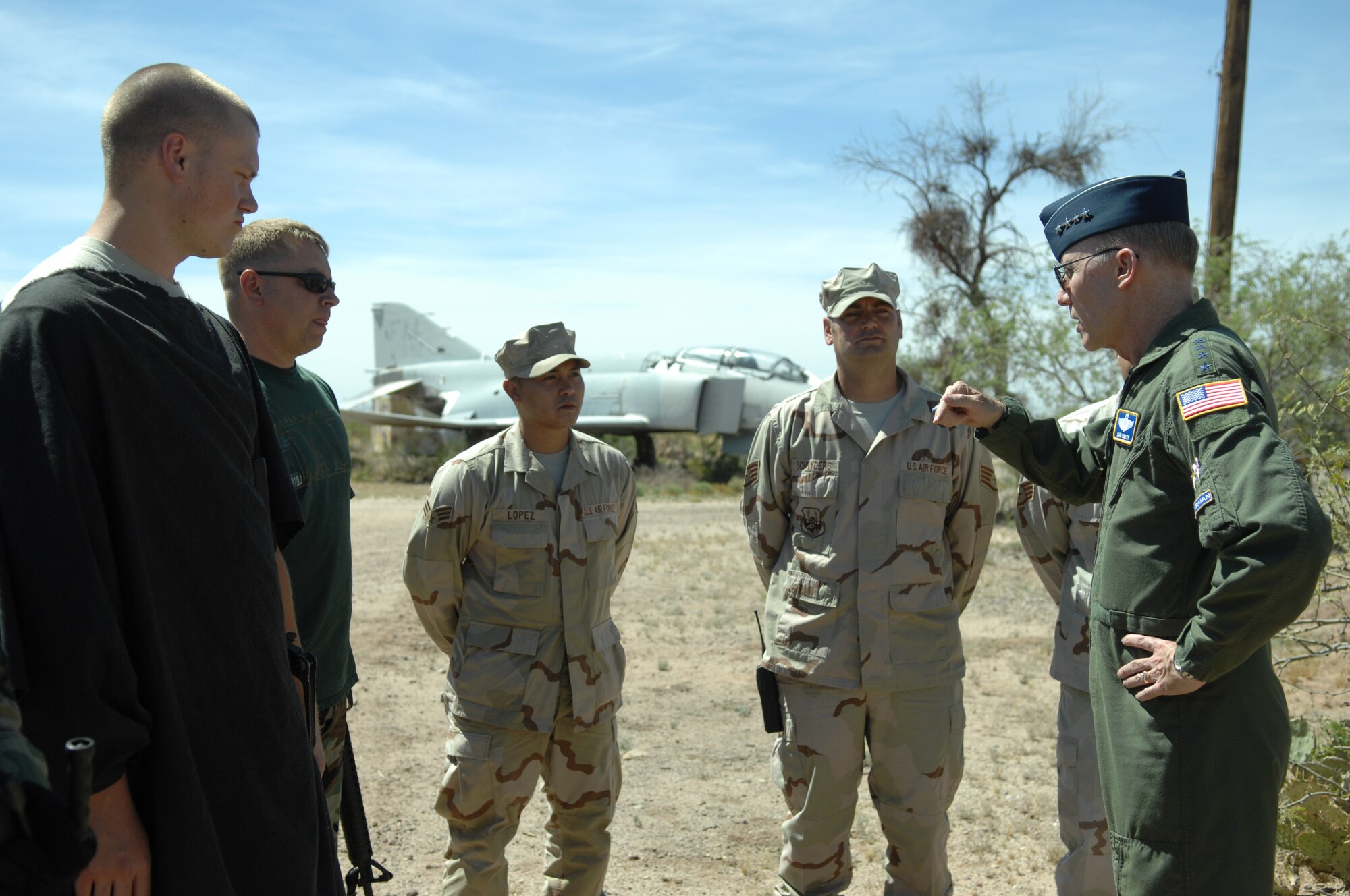 Gen. John Corley, Air Combat Command commander, speaks with airmen from the 355th Security Forces Squadron during his visit to Davis-Monthan April 15. (U.S. Air Force photo by Airman 1st Class Noah R. Johnson)