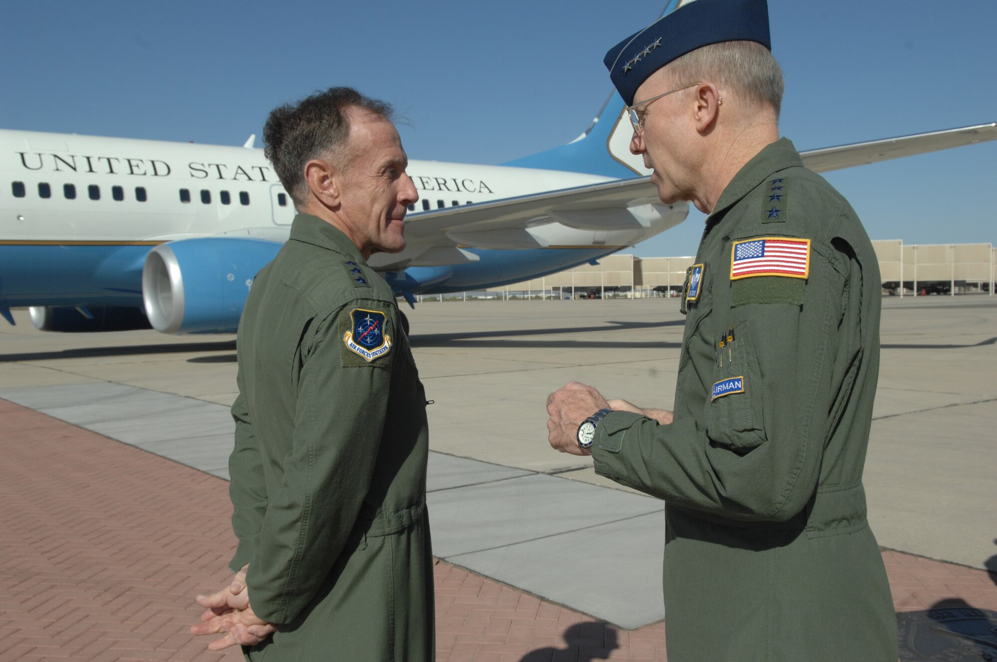 Lt. Gen. Norman Seip, Twelfth Air Force and Air Forces Southern commander, speaks with Gen. John Corley, Air Combat Command commander here April 16 before his departure from D-M.  During General Corley’s four day visit to D-M, he watched a combat search and rescue demonstration, toured the General James H. Doolittle Center, met with Airmen and attended briefings to learn about the mission.  (U.S. Air Force photo by Senior Airman Alesia Goosic)