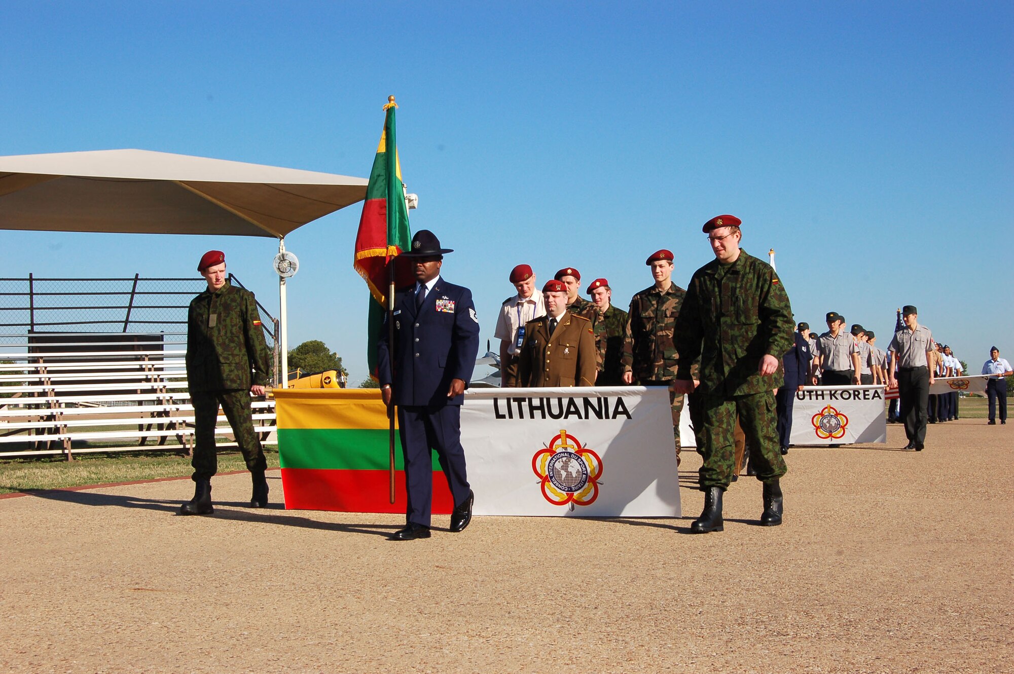 Teams of basketball players march during the opening ceremony of the 2008 International Military Sports Council Basketball Tournament April 14 at Lackland Air Force Base, Texas. The tournament features teams from the United States, Greece, Italy, South Korea, Canada, Latvia and Lithuania. (U.S. Air Force photo/Staff Sgt. Jeremy Larlee) 

