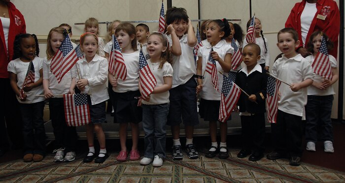 Children from the Charleston AFB Mikolajcik Child Development Center sing during the First Annual Joint Community Proclamation Signing at the Charleston Club April 4. The proclamation declared a partnership between the local community and Air Force base for prevention of sexual assault and child abuse. Mayors or their representatives from six nearby communities joined the base in signing the proclamation. (U.S. Air Force photo/Airman 1st Class Katie Gieratz)