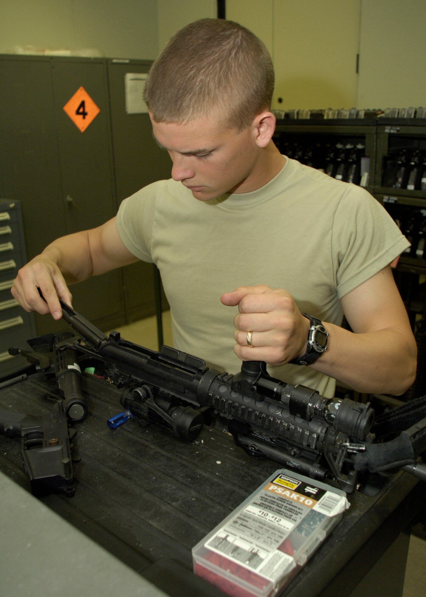 HOLLOMAN AIR FORCE BASE, N.M. -- Senior Airman Jeremy Grizzle, an armorer from the 49th Security Forces Squadron, ensures security forces Airman are armed with clean and serviceable weapons and ammunition. 