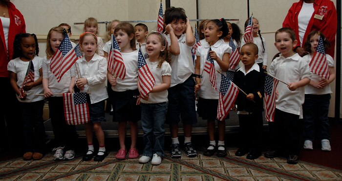 Children from the Charleston AFB Mikolajcik Child Development Center sing during the First Annual Joint Community Proclamation Signing at the Charleston Club April 4. The proclamation declared a partnership between the local community and Air Force base for prevention of sexual assault and child abuse. Mayors or their representatives from six nearby communities joined the base in signing the proclamation. (U.S. Air Force photo/Airman 1st Class Katie Gieratz)