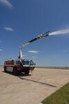 Randolph Fire and Emergency Services Branch personnel demonstrate the boom turret capability of their new Oshkosh Striker aircraft rescue firefighting vehicle. (U.S. Air Force photos by Steve White)