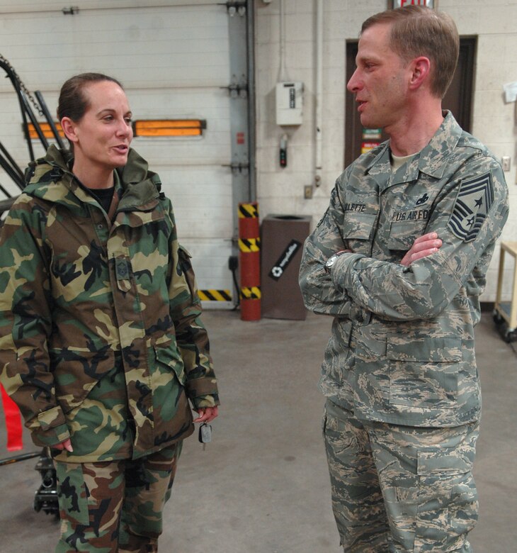 (Right to left) Chief Master Sgt. John Gillette, 28th Bomb Wing command chief, discusses the metals technology career field with Master Sgt. Susanne Herbert, 28th Maintenance Squadron Fabrication Flight chief, in the metals technology welding shop March 6.  Chief Gillette spent the afternoon speaking with Airmen around the base about their jobs.  (U.S. Air Force photo/Airman 1st Class Joshua Seybert)